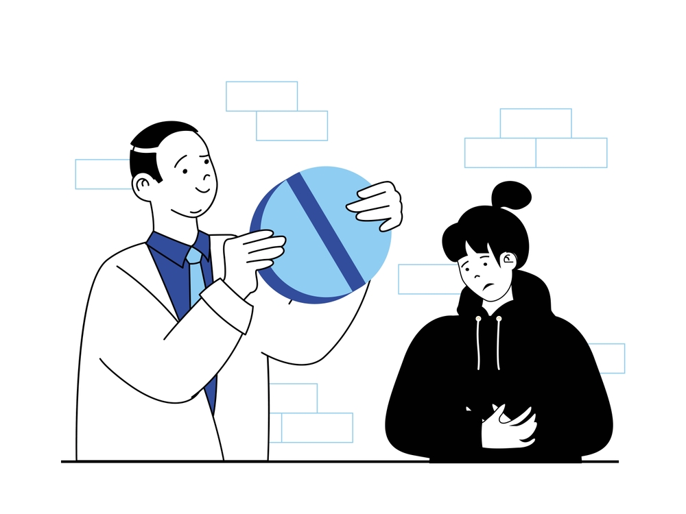 Prescriber standing with a patient